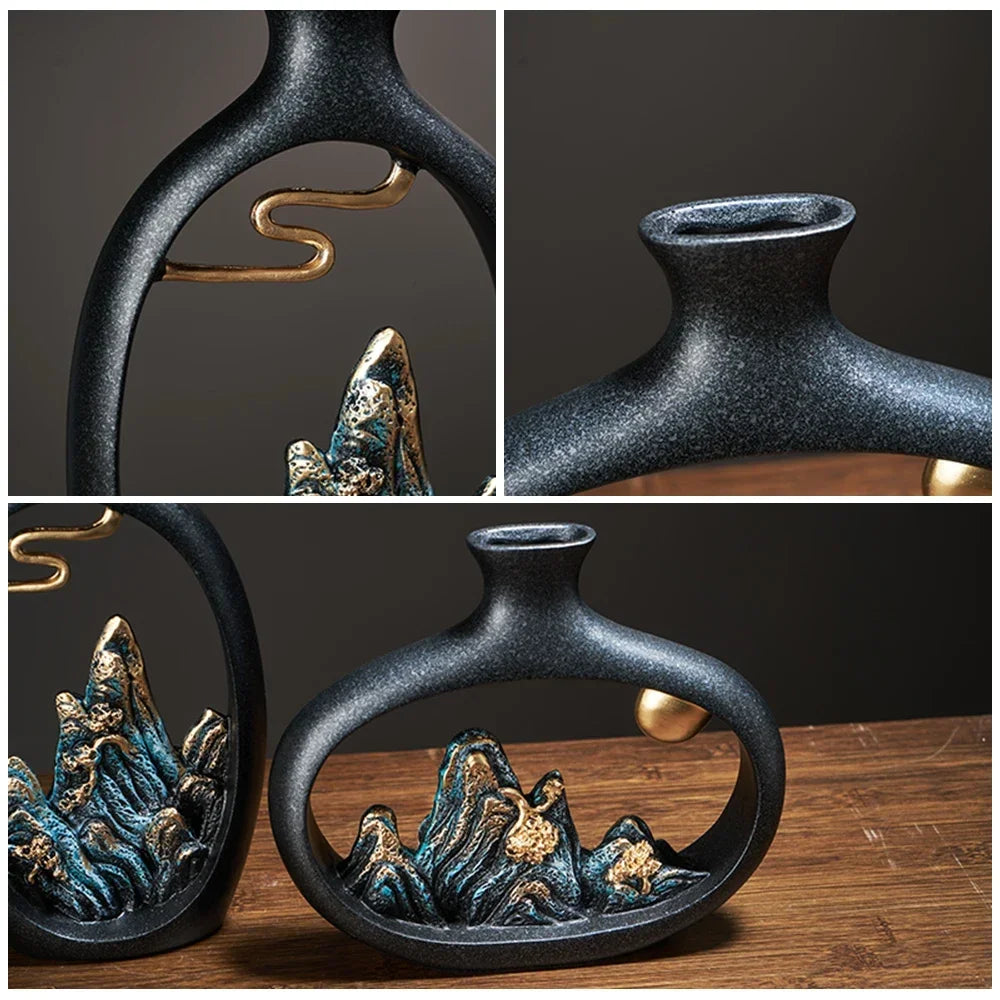 Fitlybuy TranquilPeak black ceramic vase with artistic gold-accented blue mountain landscape, shown on wood surface.