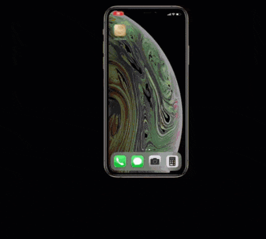 Fitlybuy PhoneStick silver drive connects to an iPhone to instantly backup photos and videos via UniversalSync.