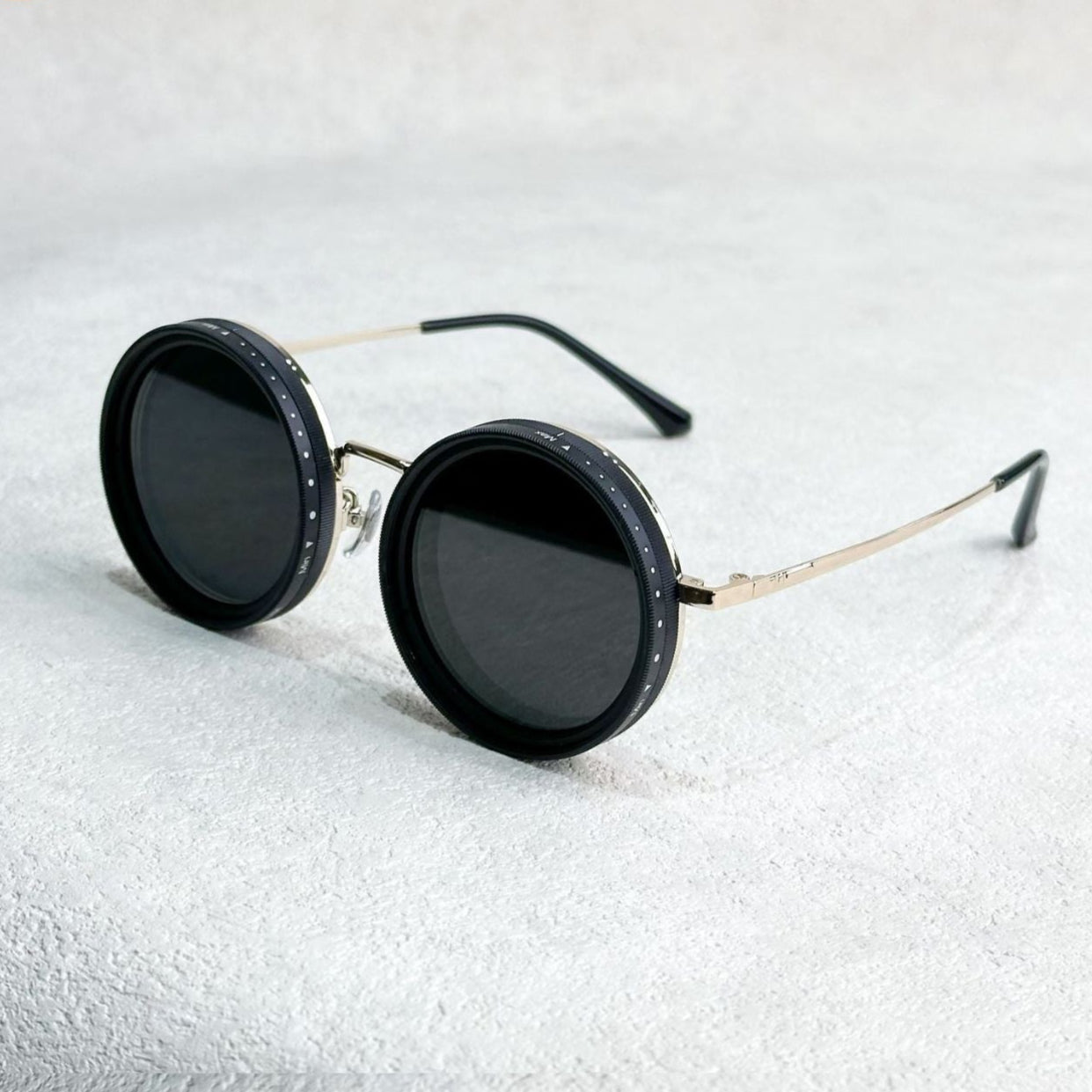 Fitlybuy unisex polarized round sunglasses with gold metal frames and adjustable light reduction dials on black lenses.
