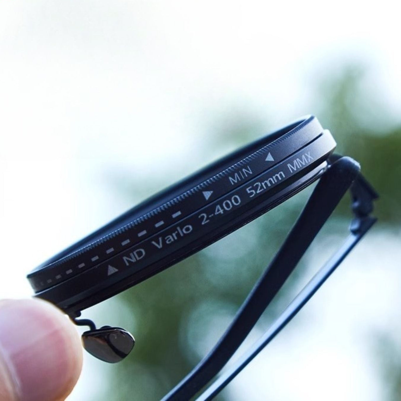 Fitlybuy unisex round polarized sunglasses with adjustable ND 2-400 light reduction lens and premium black metal frame.