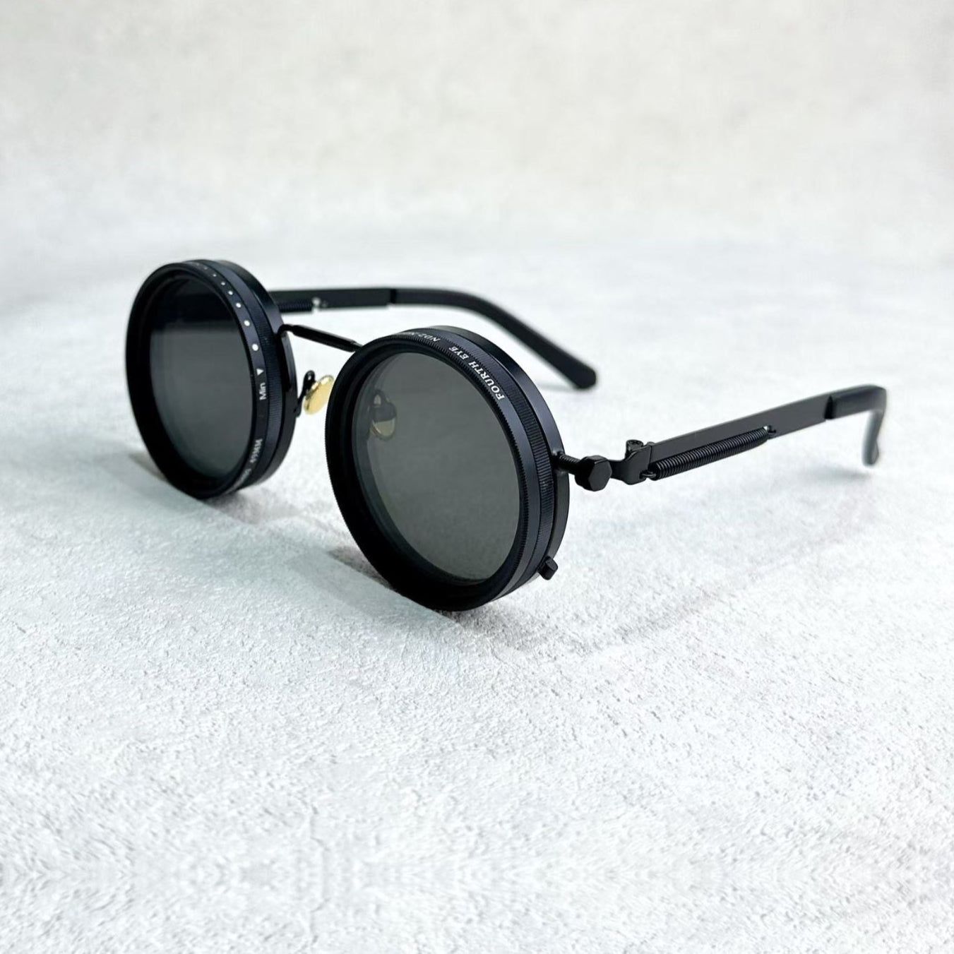 Black Fitlybuy round polarized sunglasses with adjustable light reduction lenses and a premium metal frame.