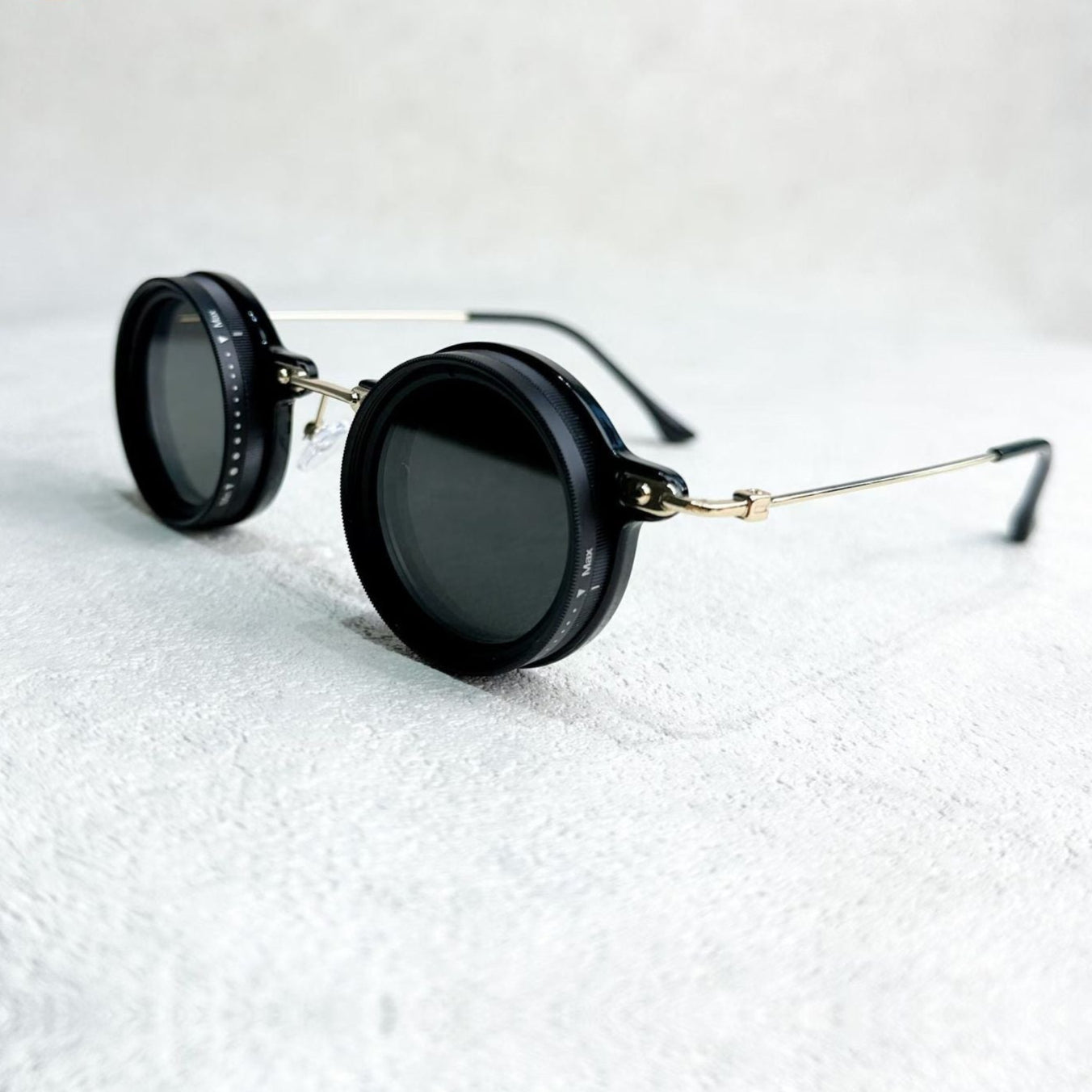 Fitlybuy unisex round polarized sunglasses with gold metal frame and adjustable light-reduction dials on black lenses.