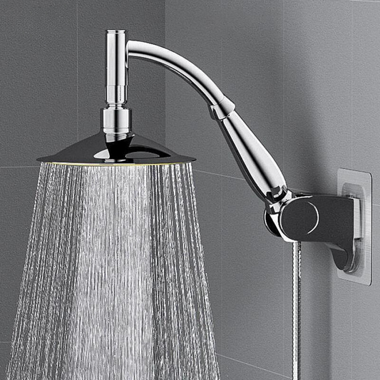 Fitlybuy RainZen chrome shower head mounted on a gray tile wall, spraying water with EcoFlow efficiency technology.