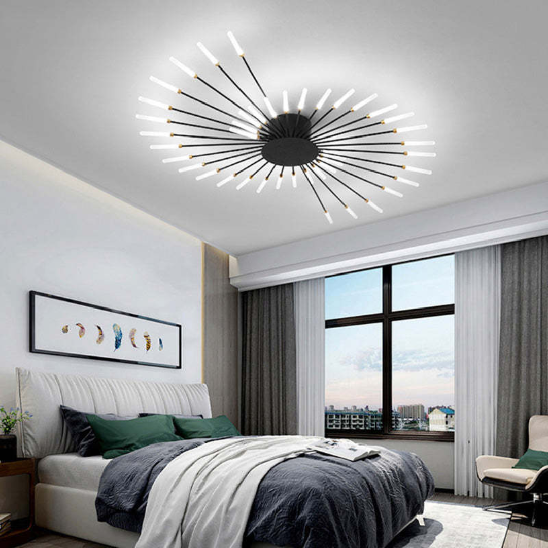 Fitlybuy large, black LED ceiling light with radial, firework-inspired arms in a modern bedroom setting.