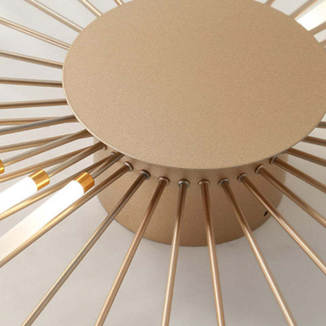 Modern gold Fitlybuy LED ceiling light with a starburst-inspired design and illuminated radial metal spokes.