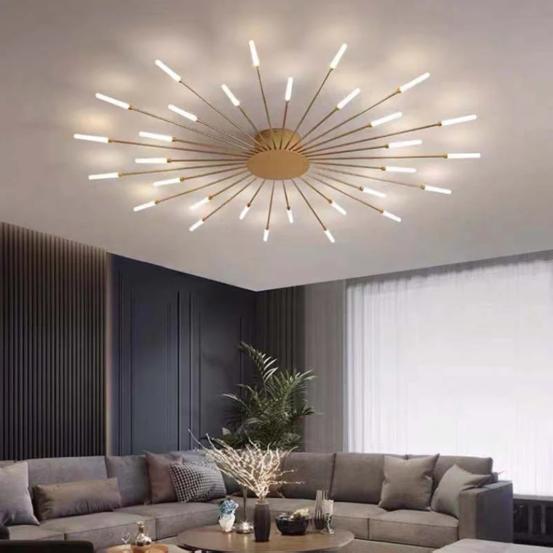 Fitlybuy starburst gold LED ceiling light with radiant energy-efficient arms, mounted in a modern living room.