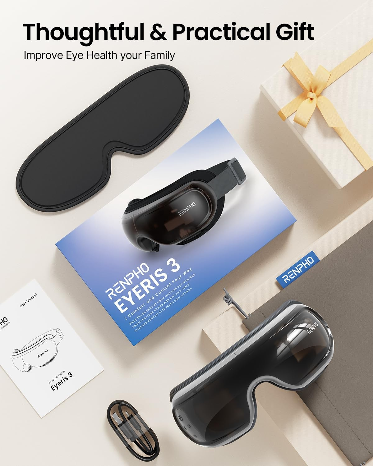 Fitlybuy Eyeris 3 eye massager with heat therapy in a gift-ready flat lay with manual, charger, and travel case.