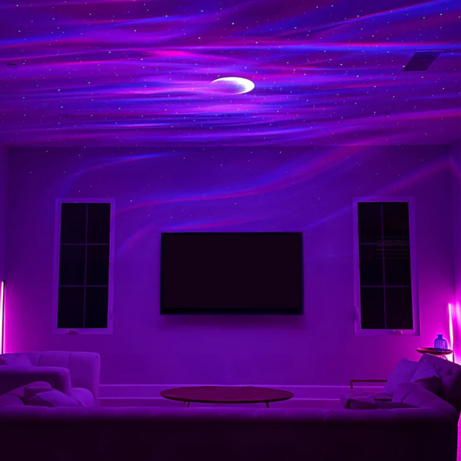 Fitlybuy Aurora projector displaying colorful Northern Lights and stars on a living room ceiling with a crescent moon.