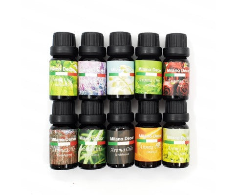 Ten 10ml amber bottles of Milano Decor aroma diffuser oils with varied floral and botanical labels on a white background.