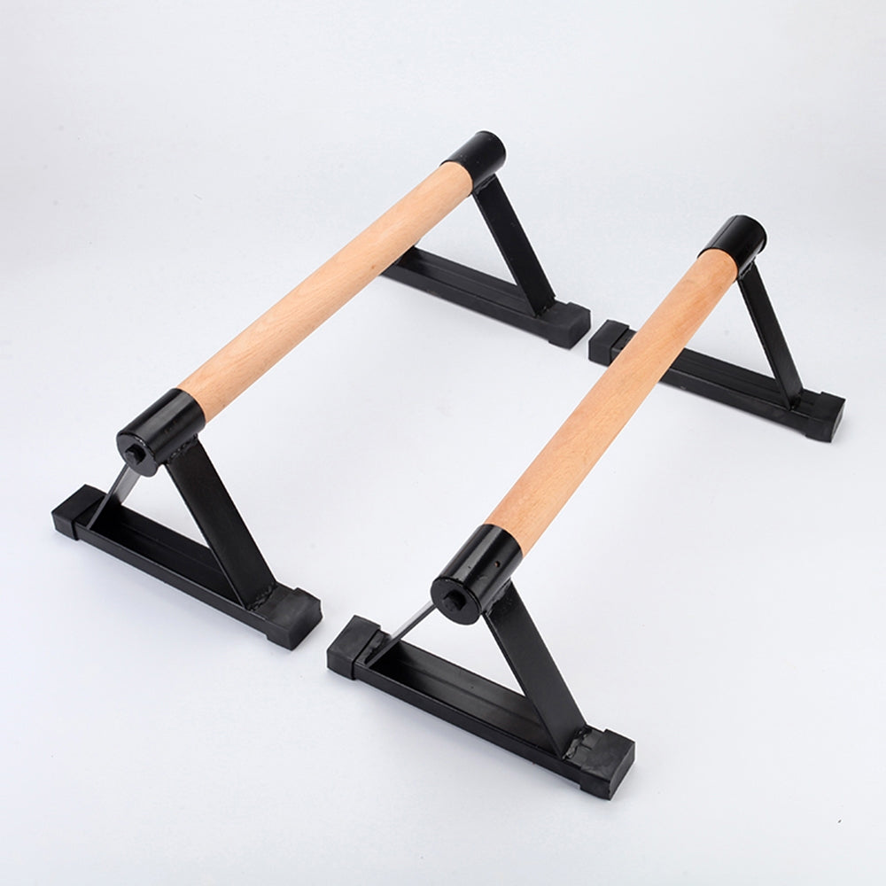 Fitlybuy Pro parallettes: A pair of black metal push-up bars with natural wood ergonomic grips on a white background.