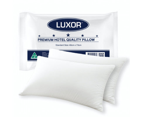 Two white Luxor premium hotel-quality Australian-made pillows in branded plastic packaging.