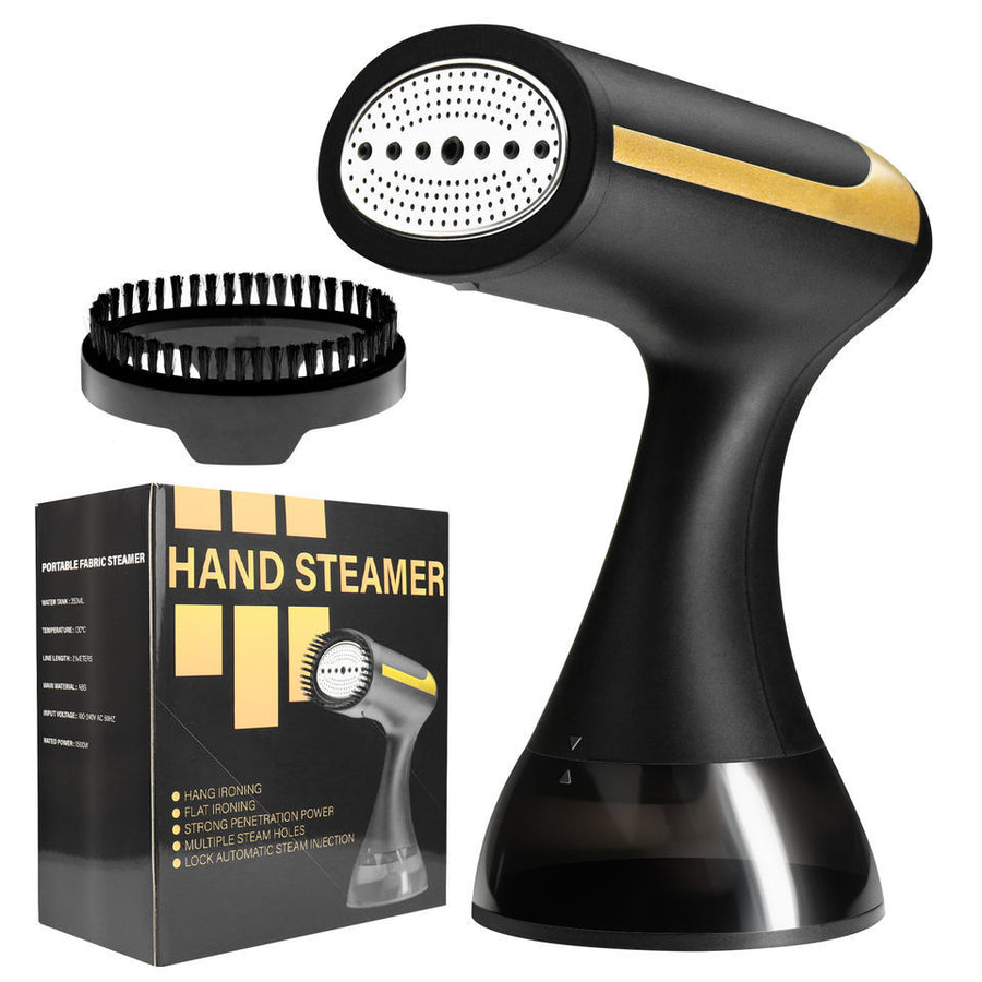 Black Steamserenity handheld clothes steamer with gold accents, nozzle attachment, and product packaging box.