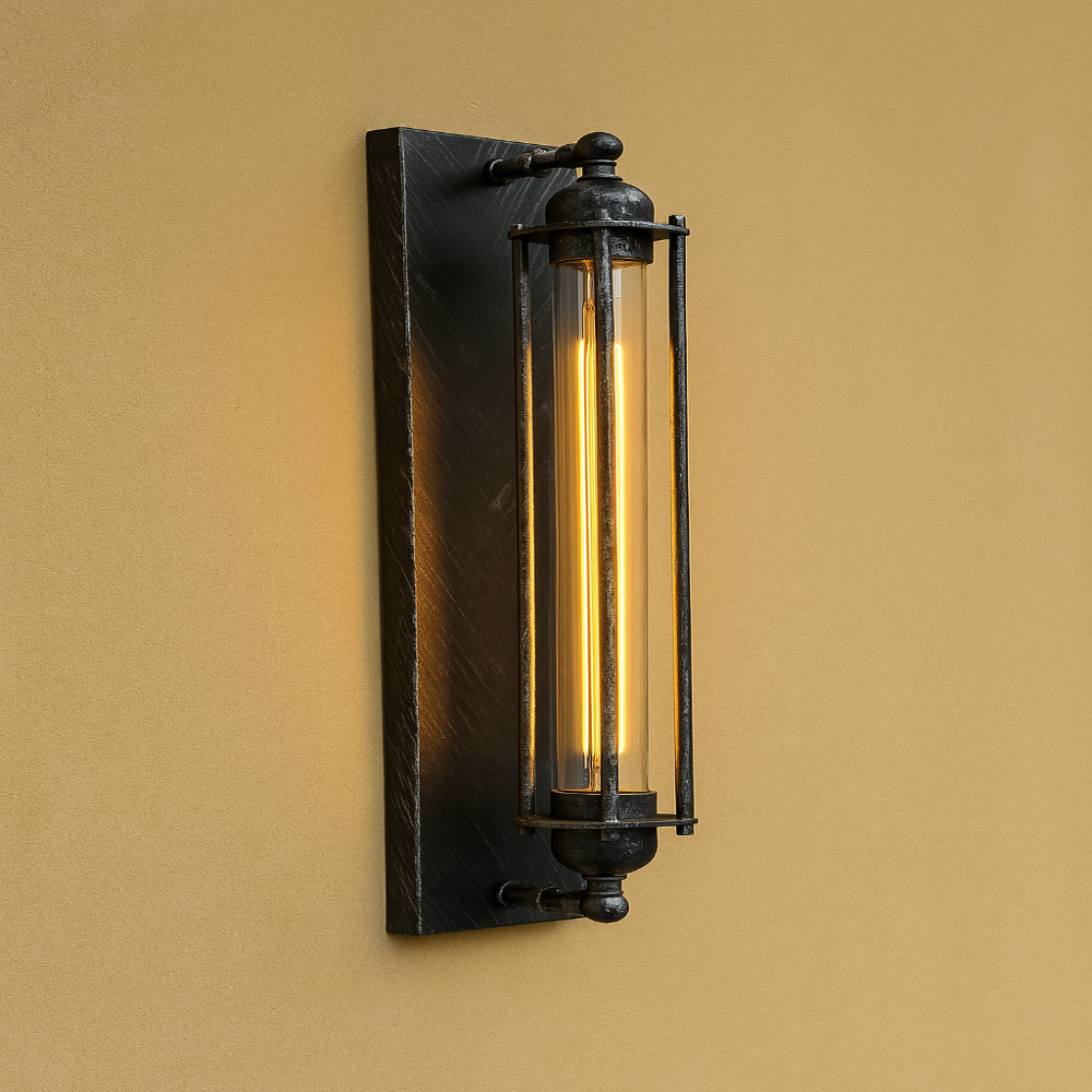 Fitlybuy vintage wall-mounted LED light in matte black with a cylindrical glass cage design on a beige wall.