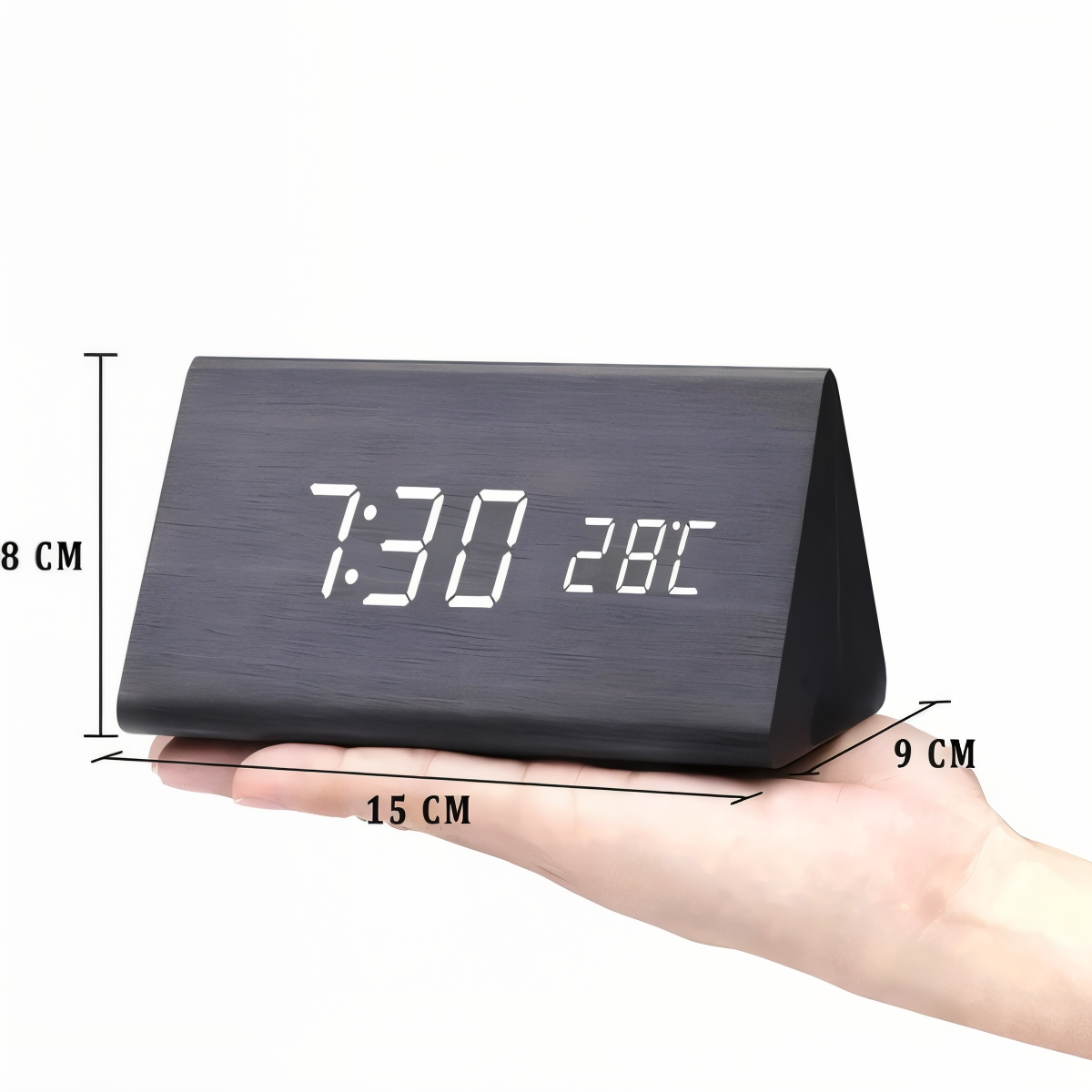 Black wooden triangle LED alarm clock with time and temp display, held in hand, showing 15x9x8cm dimensions.