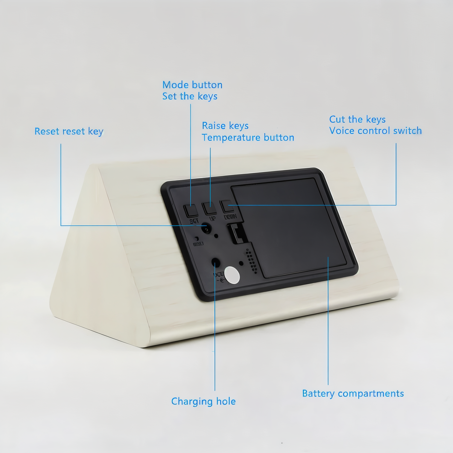 Rear view of a light wooden Fitlybuy WakeyCue alarm clock, highlighting control buttons, charging port, and battery area.