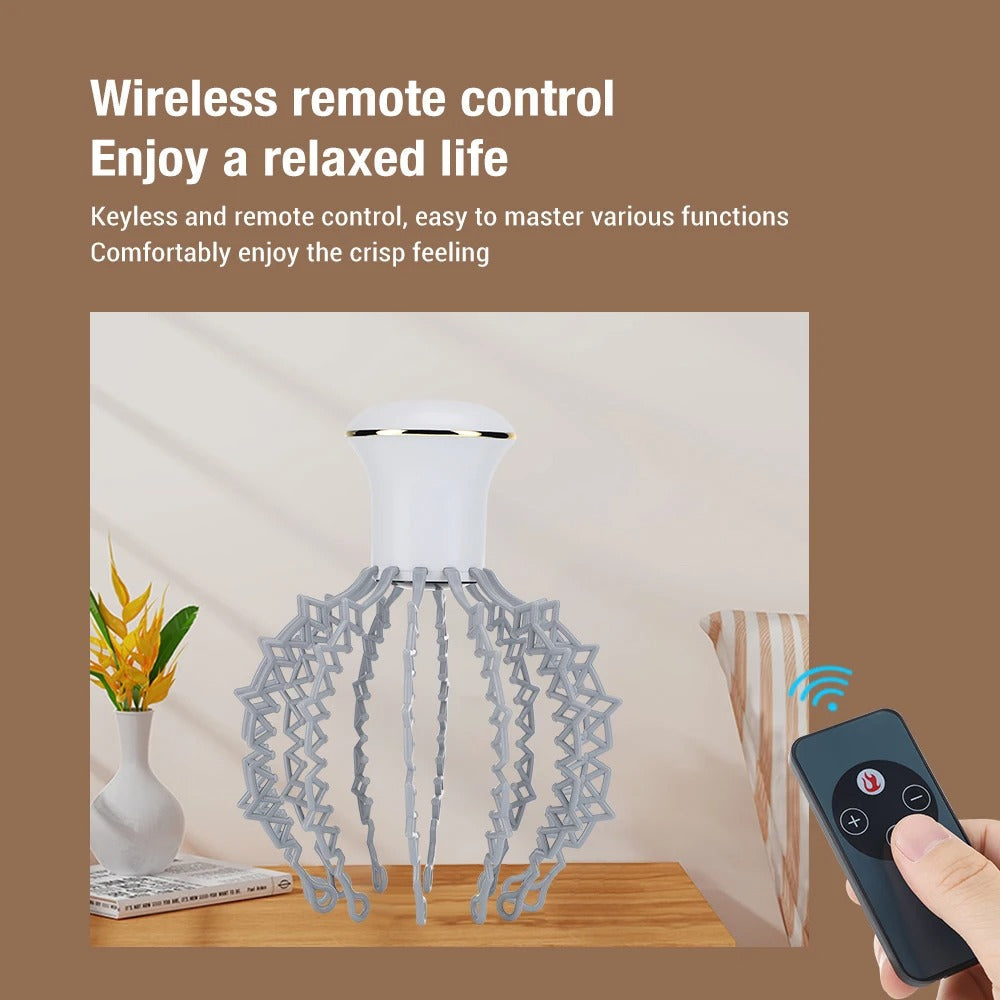 Fitlybuy white electric head massager with grey flexible prongs and remote control on a wooden table.