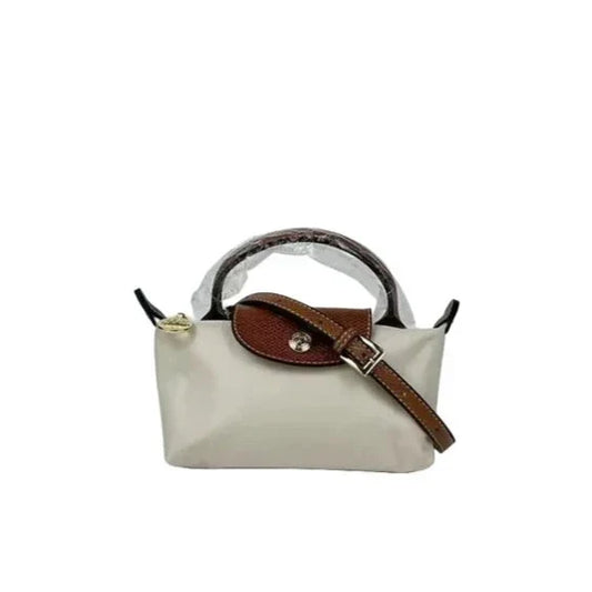 Fitlybuy Calo mini handbag: off-white body, brown textured flap and handles, crossbody strap, isolated on white.