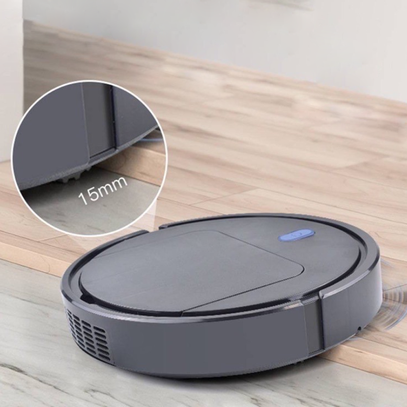 Fitlybuy AutoSweep robot vacuum in grey, showing 15mm obstacle climbing height on a hardwood floor.