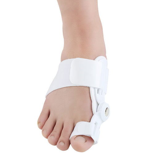 White Fitlybuy adjustable bunion corrector with ComfortFlex hinge, worn on a foot to provide arch and toe support.