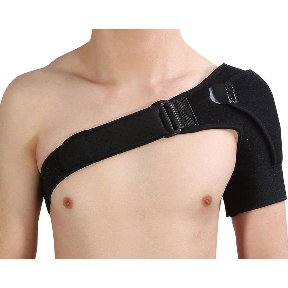 Fitlybuy Stabilise+ black adjustable shoulder brace on a person, featuring ComfortFlex support and a chest strap.