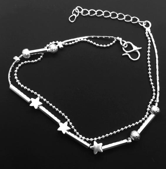 Silver Fitlybuy Sophie double-layer anklet with star charms, metallic beads, and an adjustable chain closure.