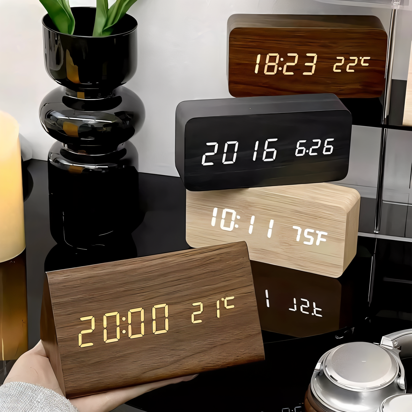 Fitlybuy WakeyCue wooden LED digital alarm clocks displaying time, date, and temperature on a black table surface.