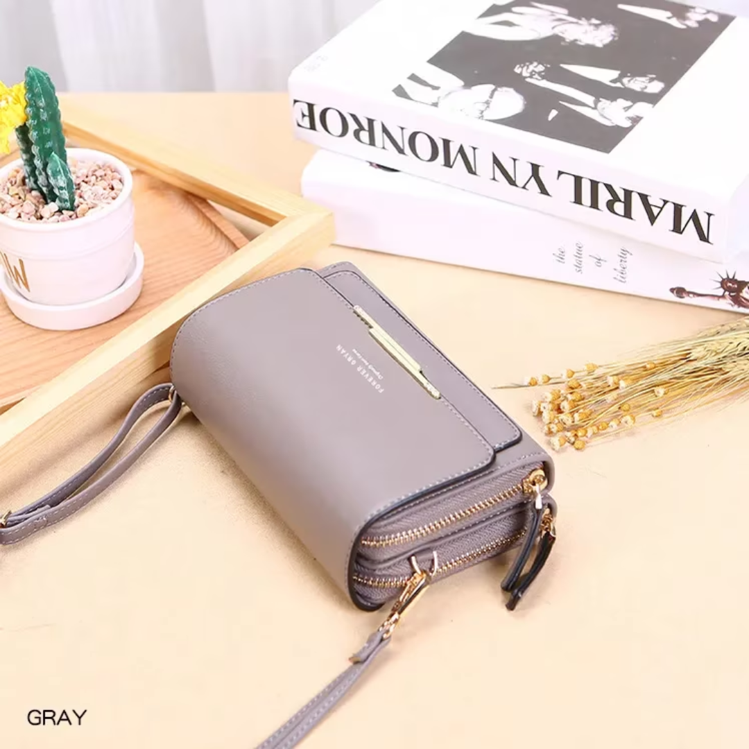 Gray leather Fitlybuy crossbody bag with dual zippered compartments, gold hardware, and a detachable shoulder strap.