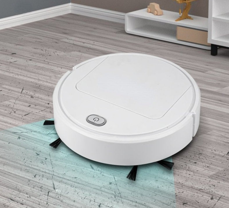 White Fitlybuy AutoSweep smart robot vacuum on a wooden floor with a highlighted cleaning zone and power button.