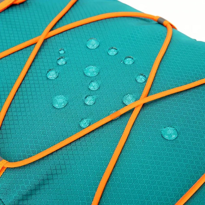 Teal waterproof Fitlybuy bike backpack with orange bungee cords and water droplets demonstrating its moisture resistance.