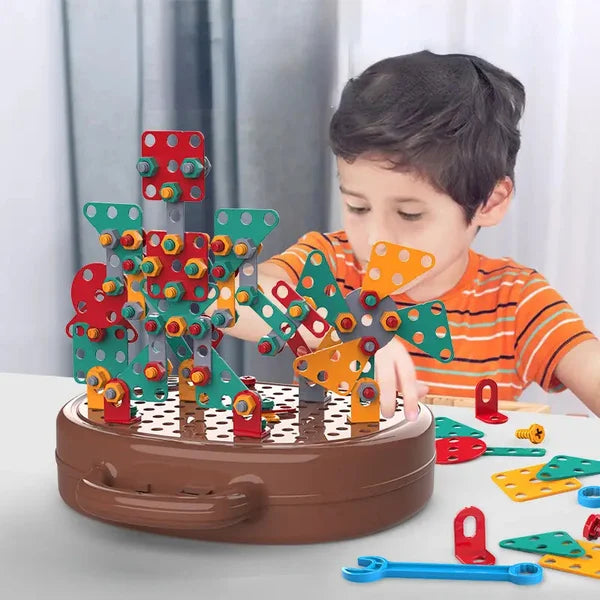 A child builds with the colorful Fitlybuy WonderBuild Montessori STEM set on its brown, round storage case.