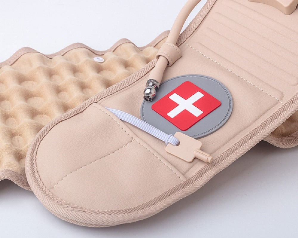 Beige Fitlybuy decompression back belt featuring an inflatable lumbar support tube, nozzle, and red Swiss cross emblem.