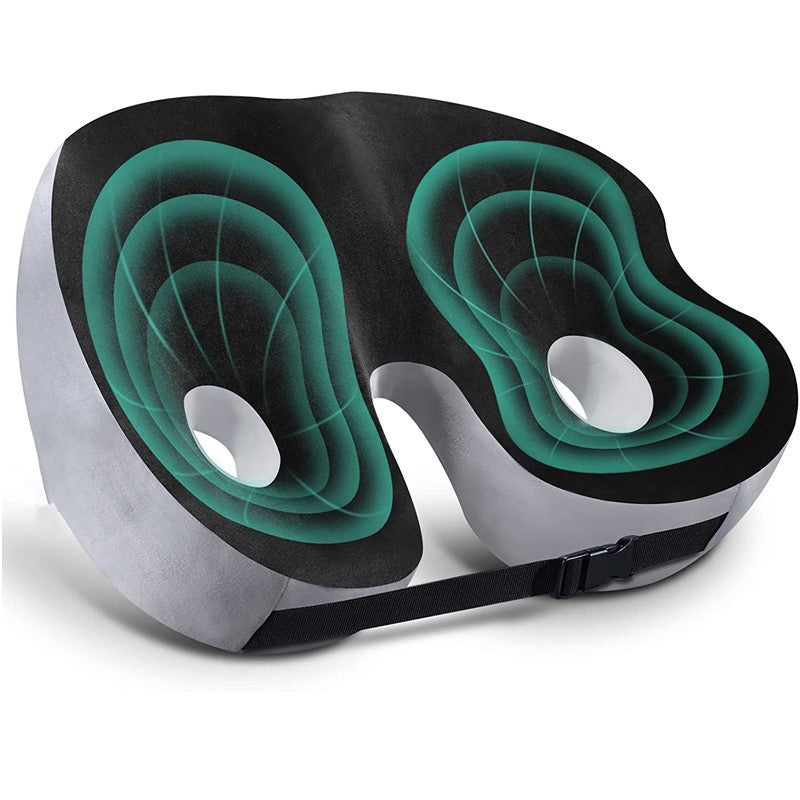 Black and grey ergonomic sciatica relief cushion with cutouts, green pressure-mapping graphics, and an adjustable strap.