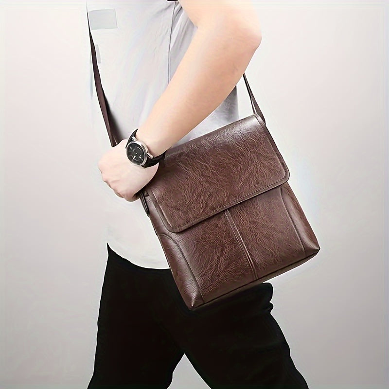 Fitlybuy vintage brown PU leather shoulder bag with a fold-over flap and adjustable strap worn by a person.