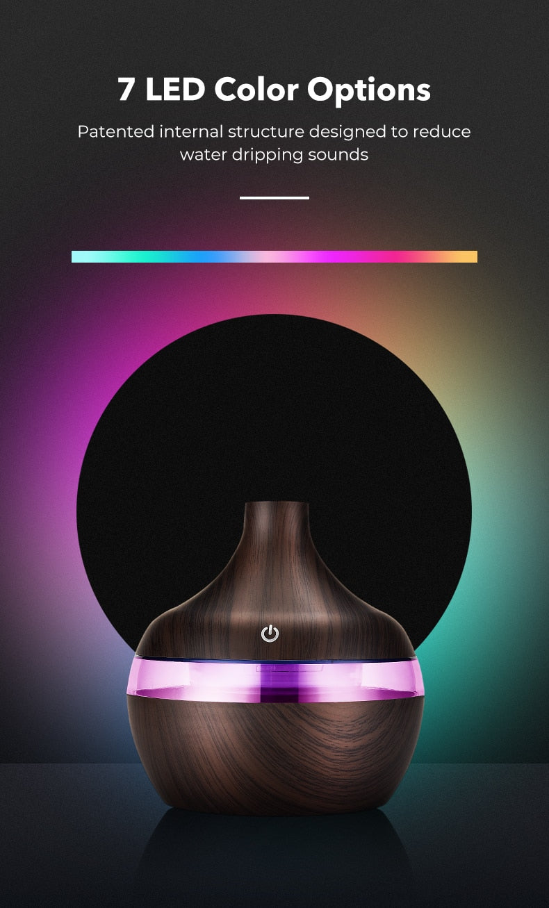 Fitlybuy wood-grain aroma diffuser with 7 LED color options, ultrasonic technology, and quiet operation design.