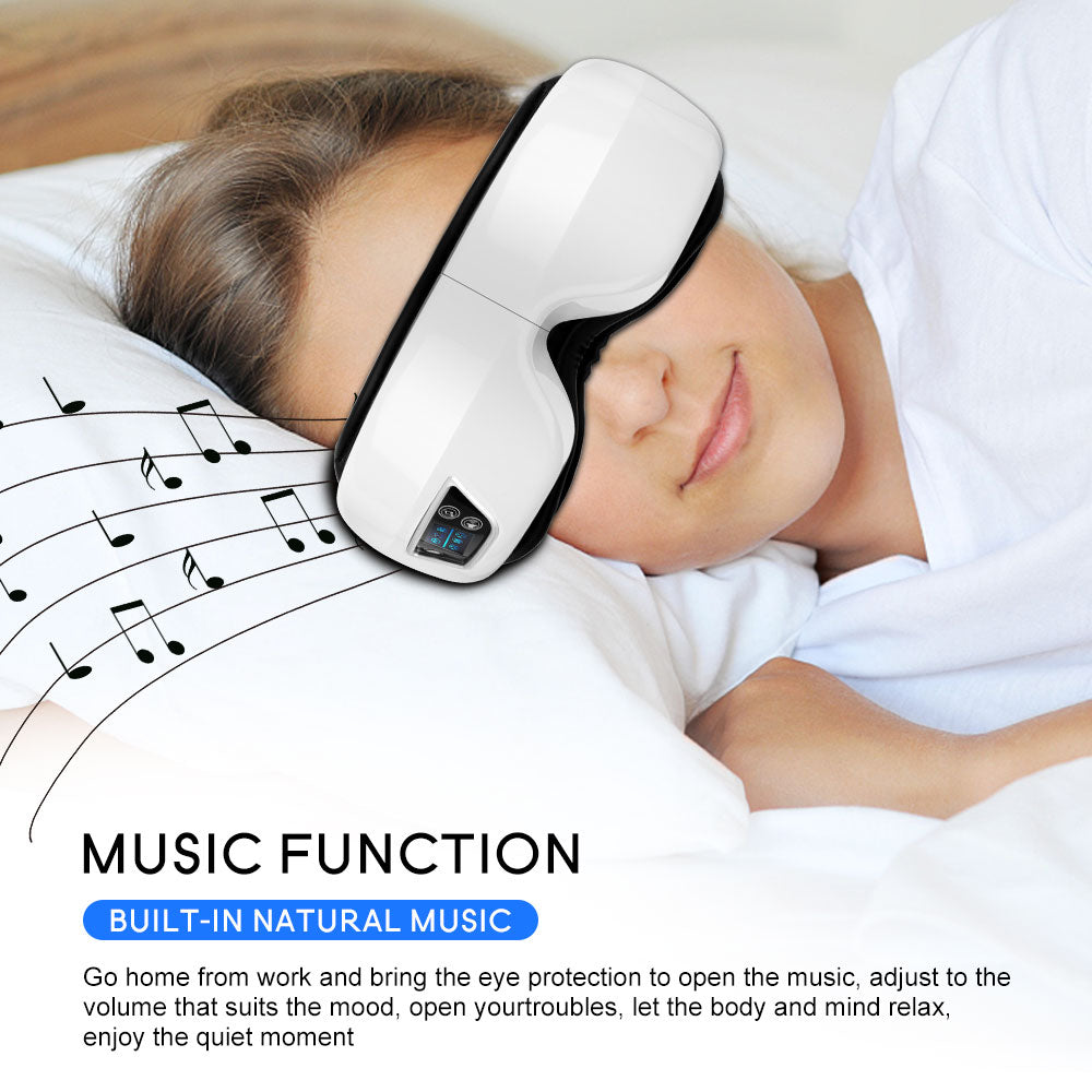 A person rests on a pillow wearing a white Fitlybuy 4D air compression eye massager with built-in music features.