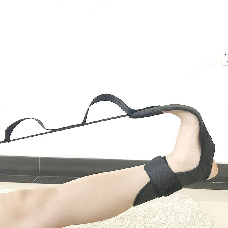 Fitlybuy black leg stretcher with multiple strap loops, securing a person's foot to aid in deep physical therapy stretches.