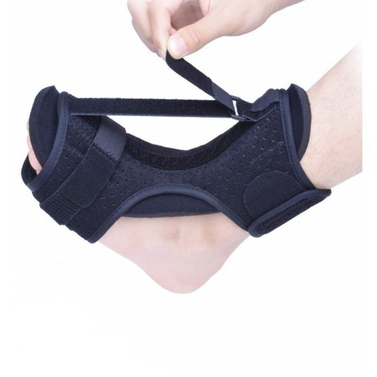 Black Fitlybuy adjustable orthopedic foot and ankle splint being secured by hand on a person's foot.