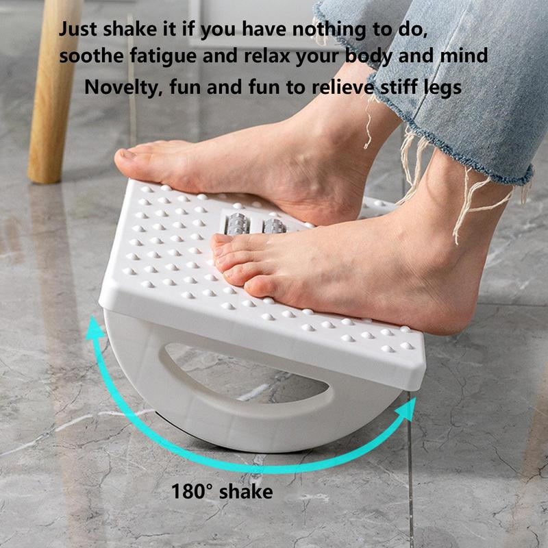 White Fitlybuy ergonomic rocker footrest with a textured surface and massage rollers being used by bare feet.