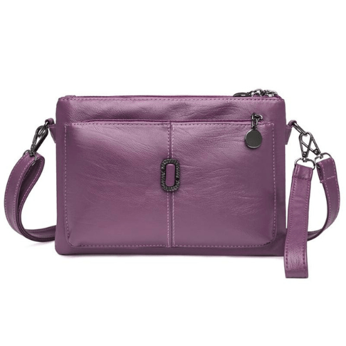 Fitlybuy Fosh small purple leather shoulder bag with a premium finish, front zip pocket, and dark metal hardware.