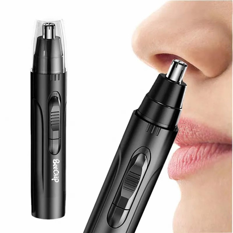 Black rechargeable nose and ear hair trimmer with silver precision blades being used by a person.