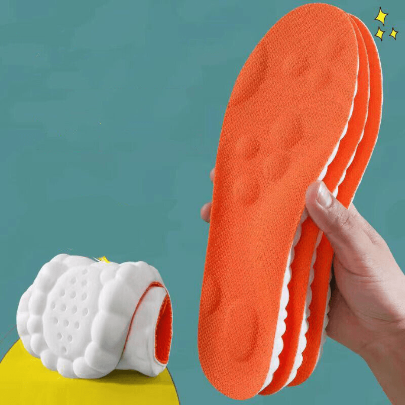 Fitlybuy AirCloud orange insoles featuring white ComfortWave cushioning, held by hand with a rolled-up sample.
