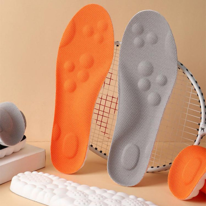 Fitlybuy AirCloud Relief Insoles with textured orange and gray surfaces, leaning on a tennis racket for athletic context.