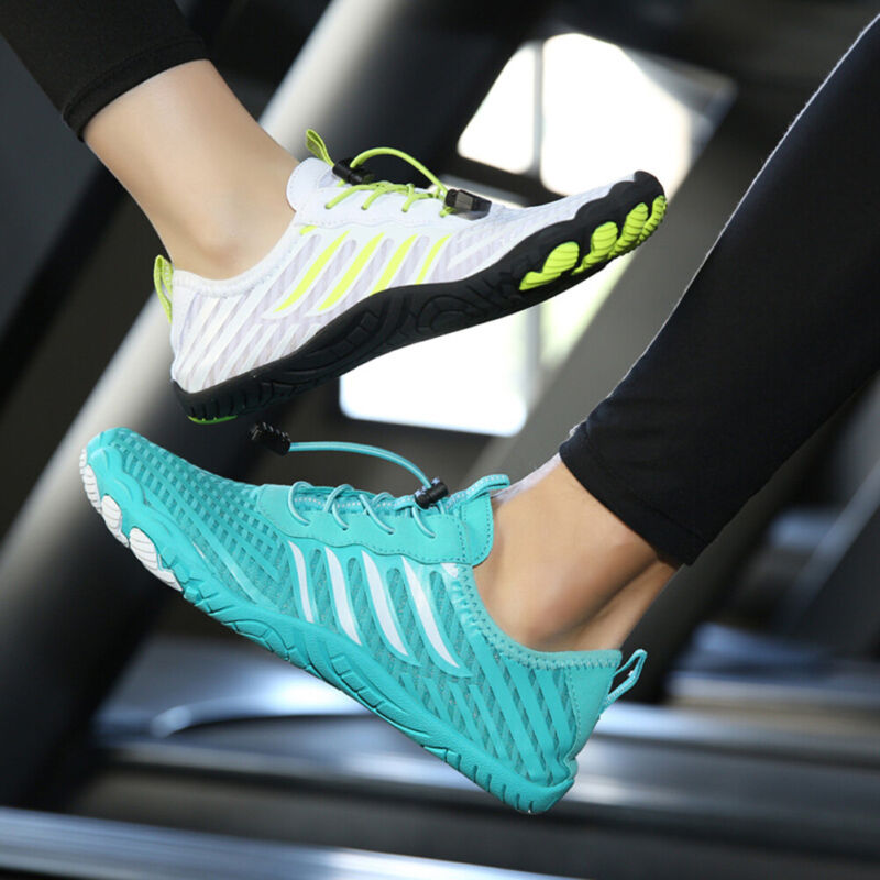 Fitlybuy non-slip barefoot shoes in white/lime and teal with FlexiGrip soles, shown on feet during a gym workout.