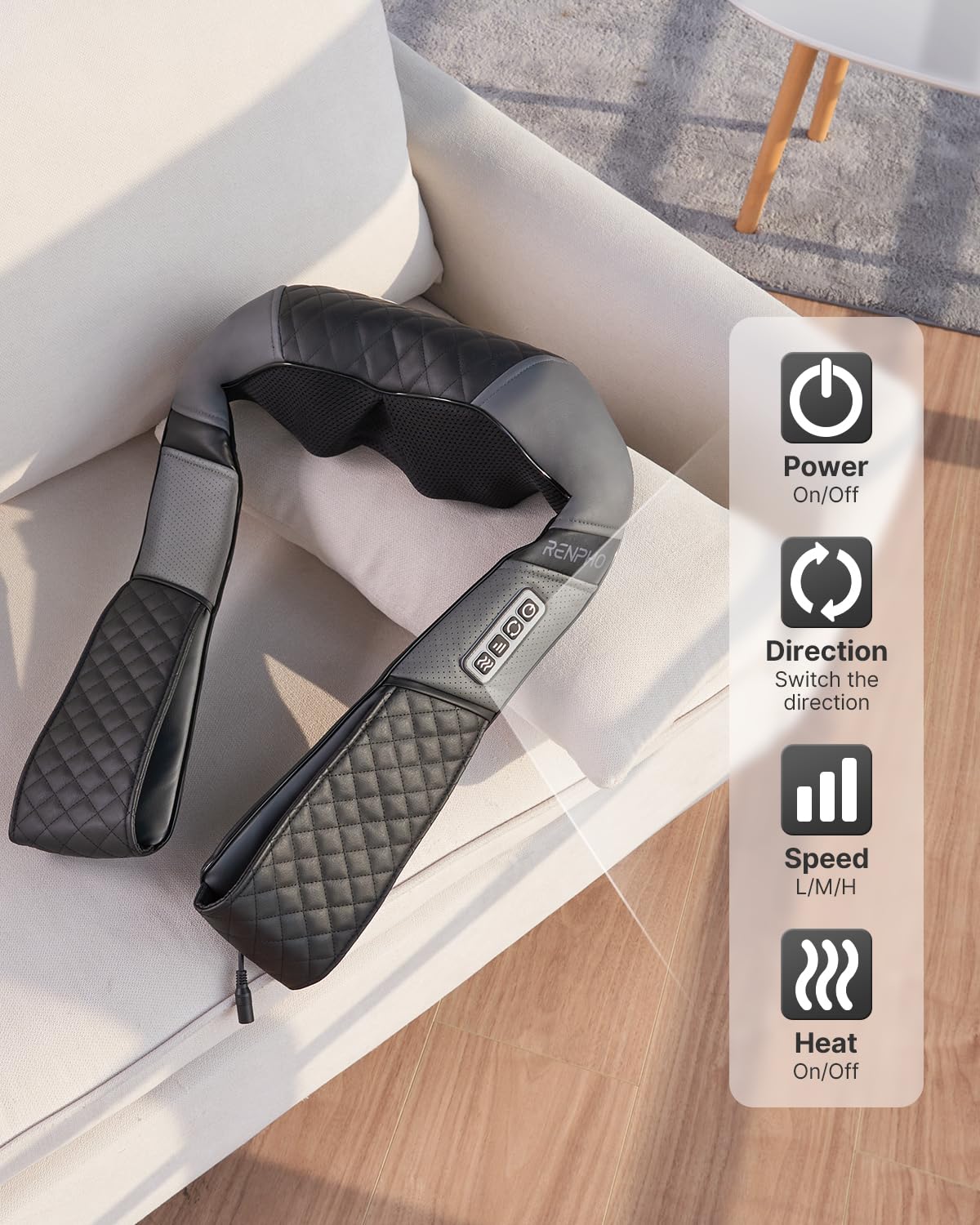 Fitlybuy U-Neck black and grey neck massager with heat therapy, featuring control buttons on a sofa.
