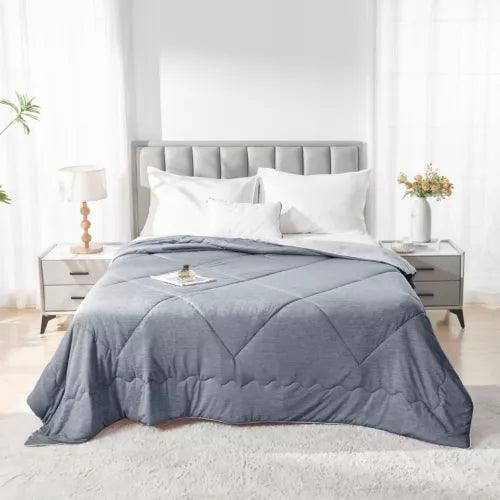 Fitlybuy Aussie Cool grey cooling blanket with diamond stitching on a bed in a bright, modern bedroom.