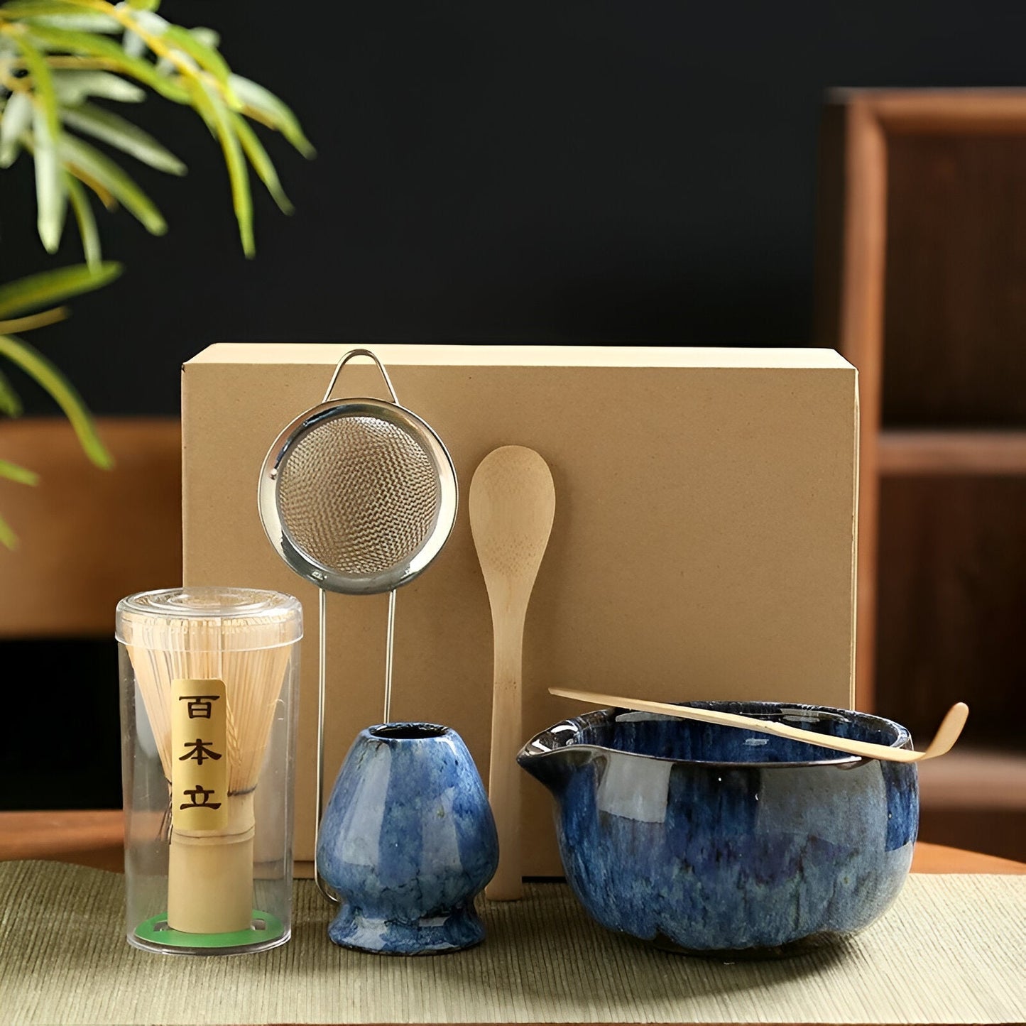 Fitlybuy 6-piece matcha set with blue ceramic bowl, whisk, stand, bamboo spoon, and strainer in a gift box.