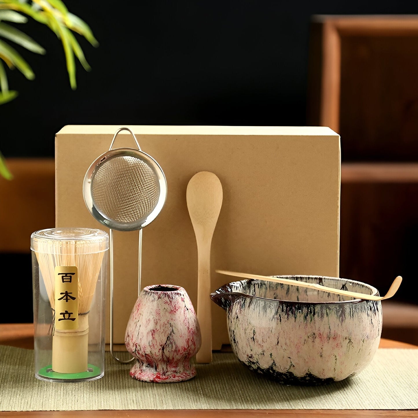 Fitlybuy 6-piece Japanese matcha set: ceramic bowl and whisk holder in pink-speckled glaze, bamboo whisk, scoop, sieve.