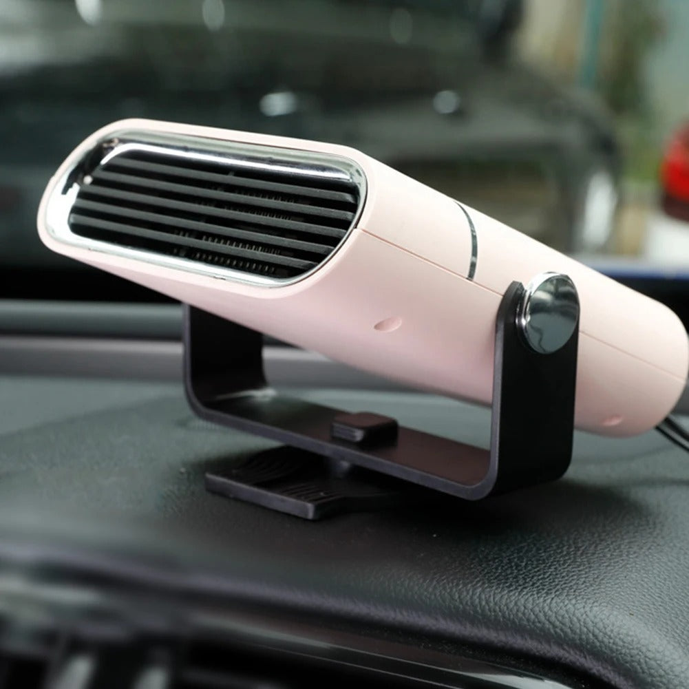 Pale pink Fitlybuy 4-in-1 car heater and cooling fan with black 360° rotating stand mounted on a car dashboard.