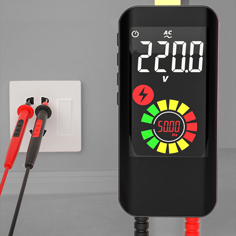 Fitlybuy smart digital multimeter showing 220V reading, with probes testing a wall outlet to measure voltage and Hz.