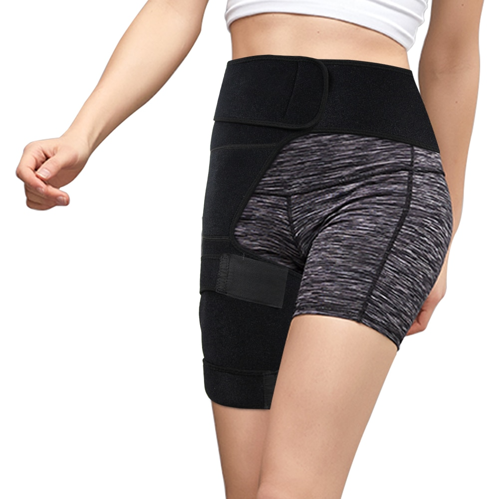 Fitlybuy black orthopedic hip brace with adjustable velcro straps worn over grey athletic shorts for support.